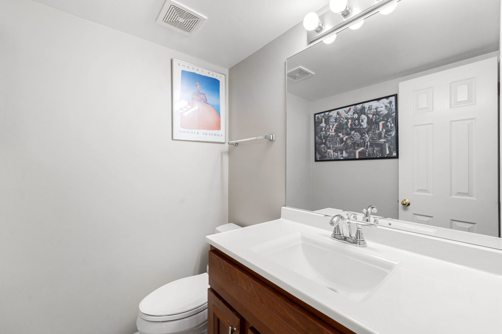 36132 North Springbrook Lane Gurnee, IL 60031 - Photo 15 of 30 a bathroom with a sink toilet and vanity