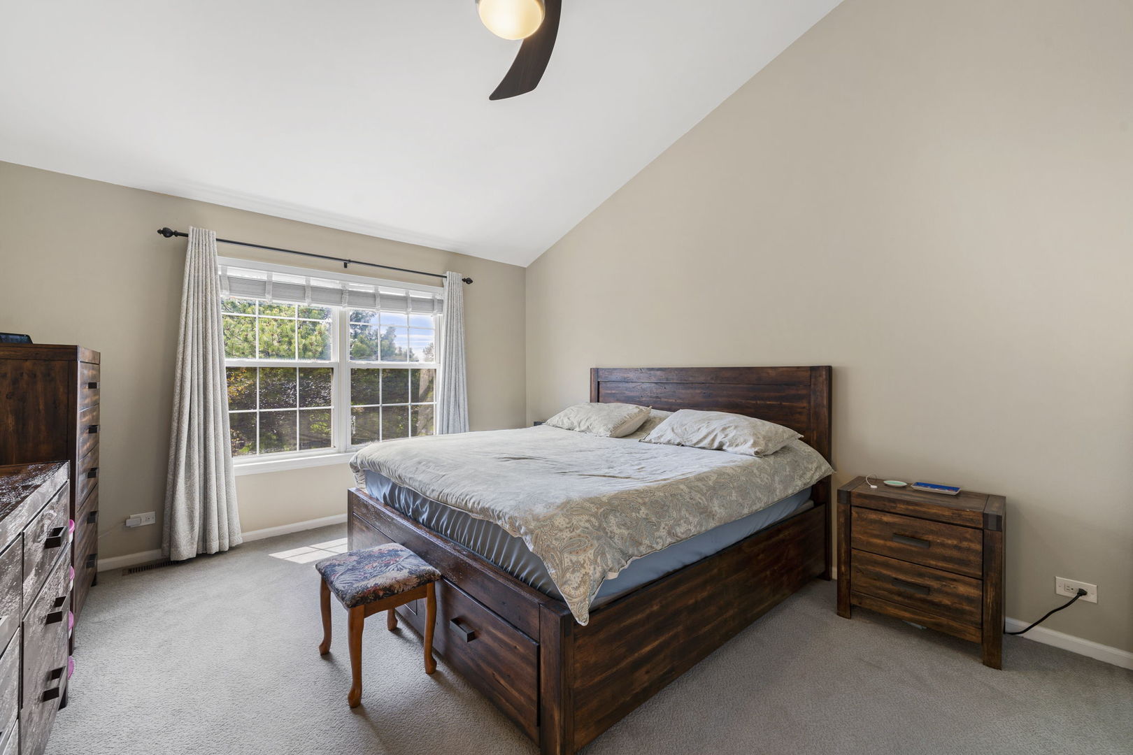 36132 North Springbrook Lane Gurnee, IL 60031 - Photo 17 of 30 a bed sitting in a room next to a window