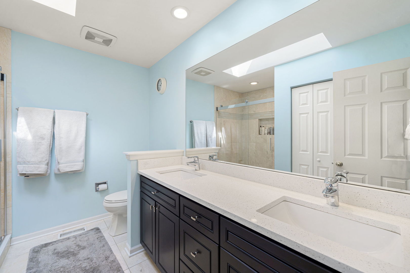 36132 North Springbrook Lane Gurnee, IL 60031 - Photo 19 of 30 a bathroom with a double vanity sink mirror and toilet