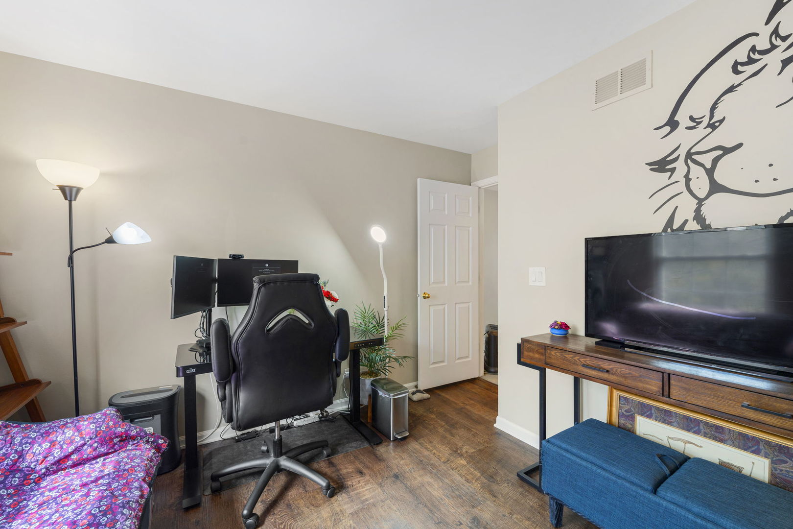 36132 North Springbrook Lane Gurnee, IL 60031 - Photo 23 of 30 a living room with furniture and a flat screen tv