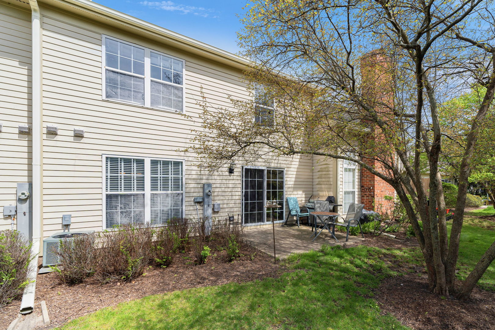 36132 North Springbrook Lane Gurnee, IL 60031 - Photo 26 of 30 a front view of a house with patio