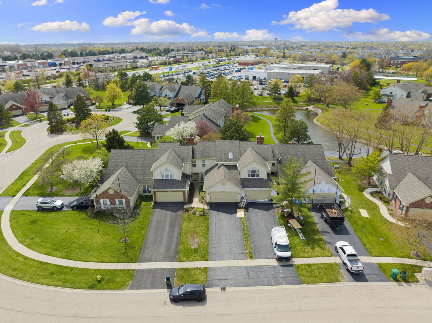 36132 North Springbrook Lane Gurnee, IL 60031 - Photo 28 of 30 an aerial view of residential houses with outdoor space and parking