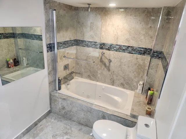 a bathroom with a sink and a bathtub