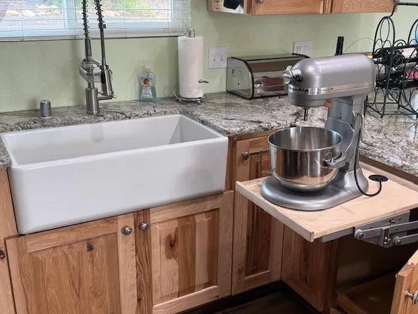 a kitchen with a stove and a sink