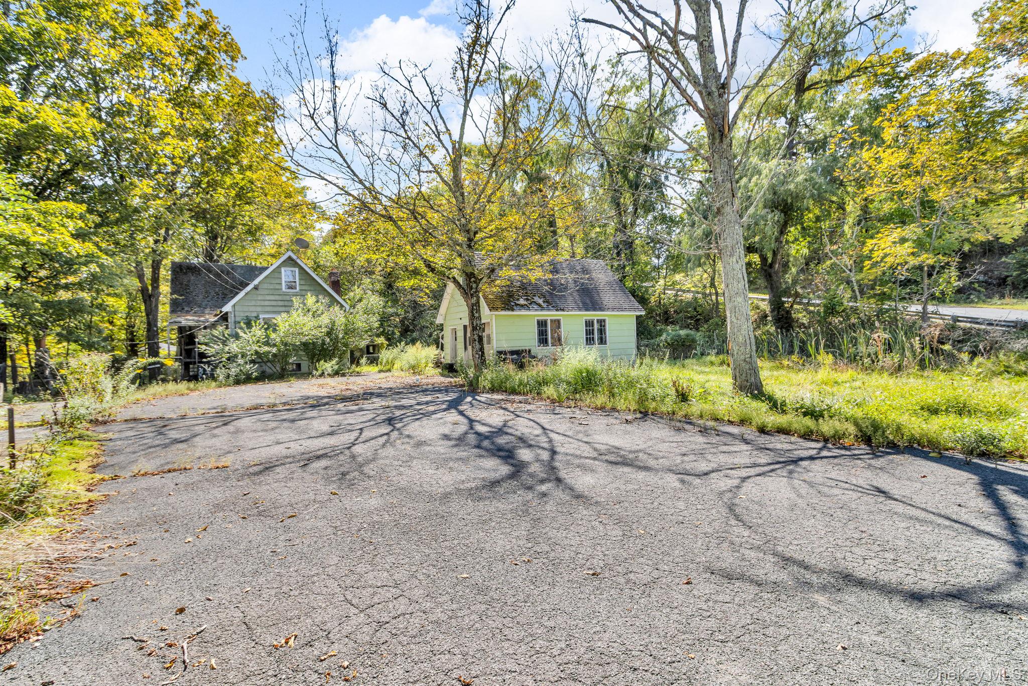 a view of house with outdoor space and street view
