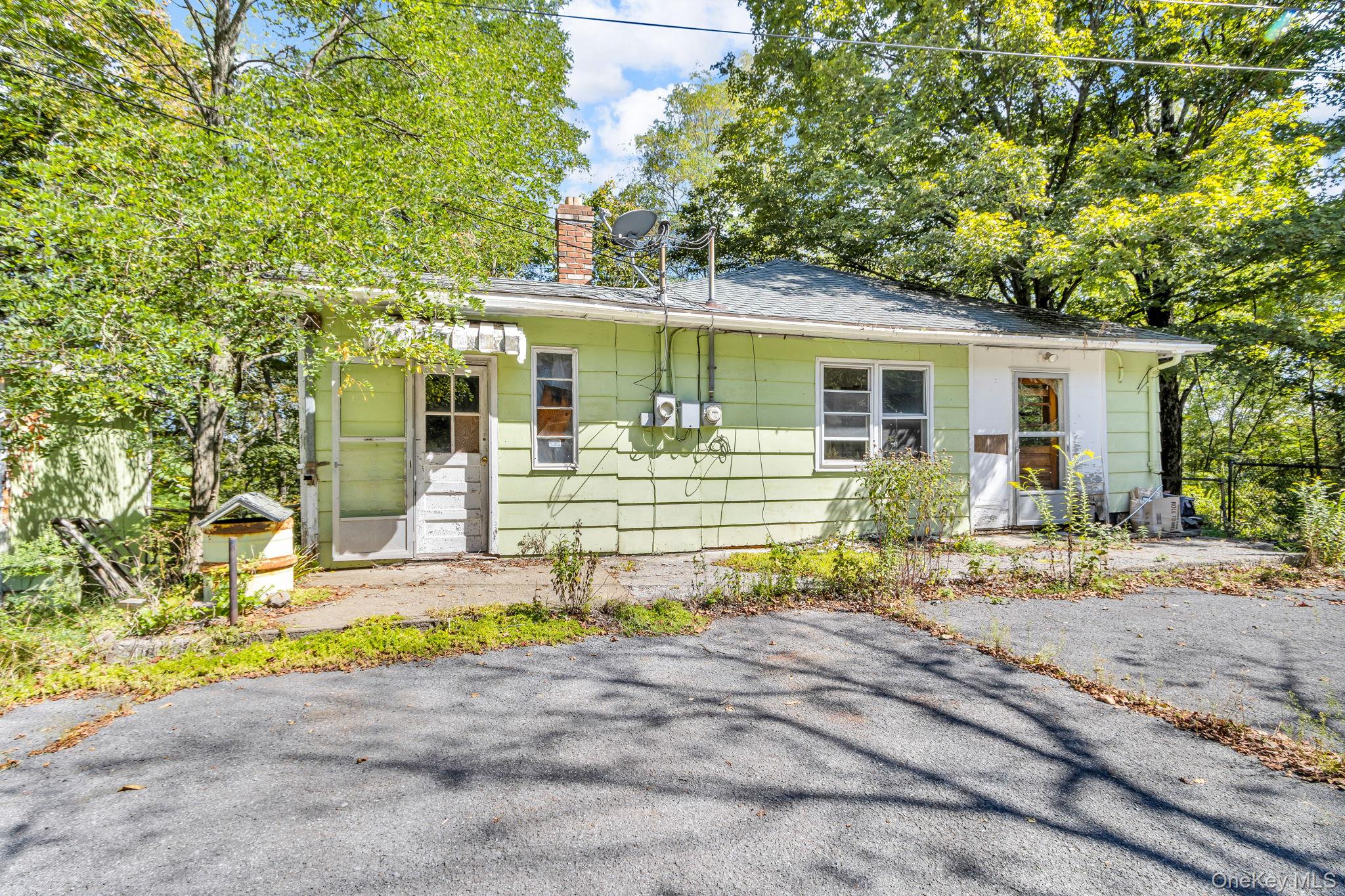 31 Foster Road Cairo, NY 12413 - Photo 30 of 38 front view of a house with a patio