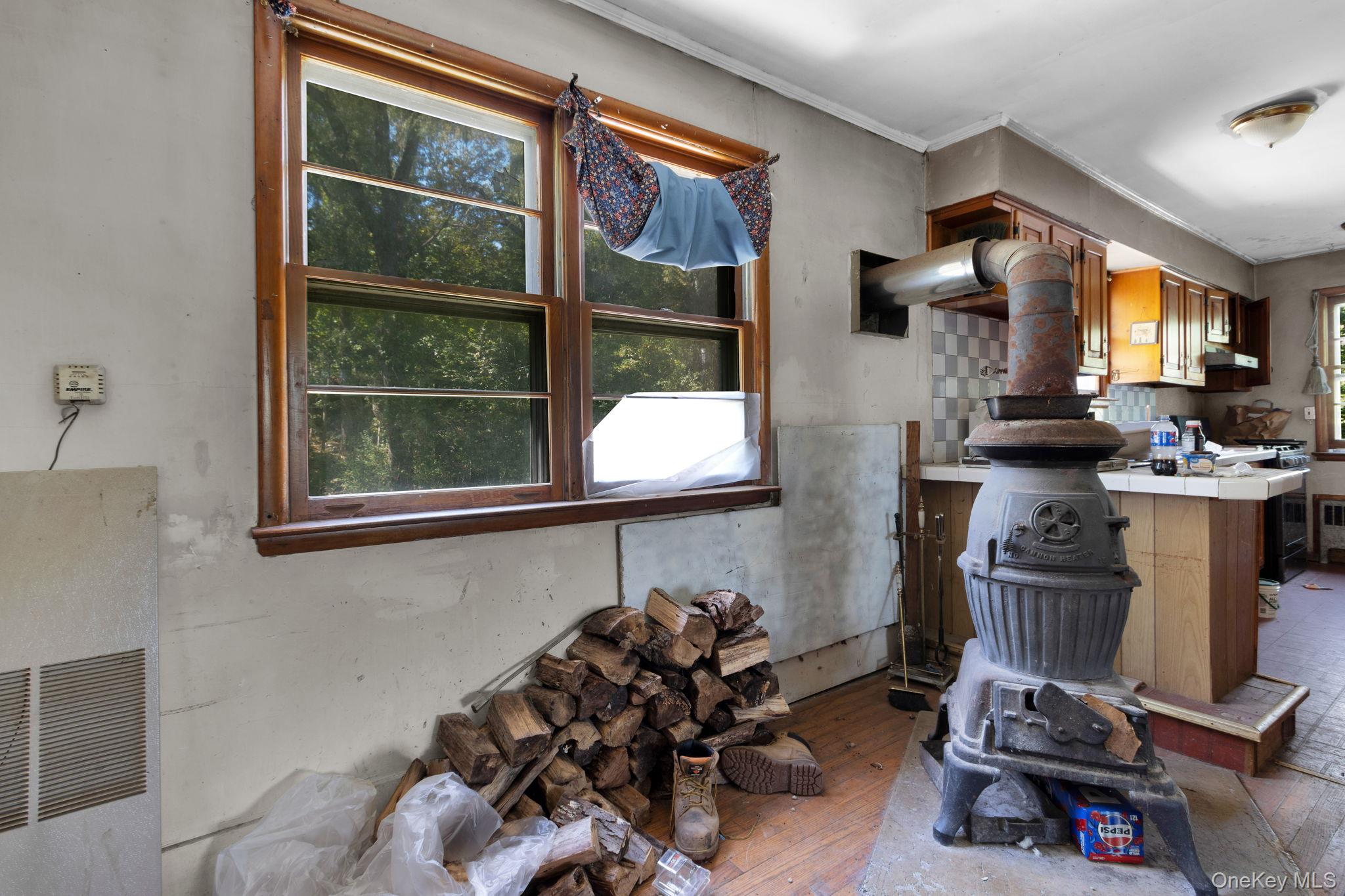31 Foster Road Cairo, NY 12413 - Photo 10 of 38 a view of a livingroom with workspace and a window
