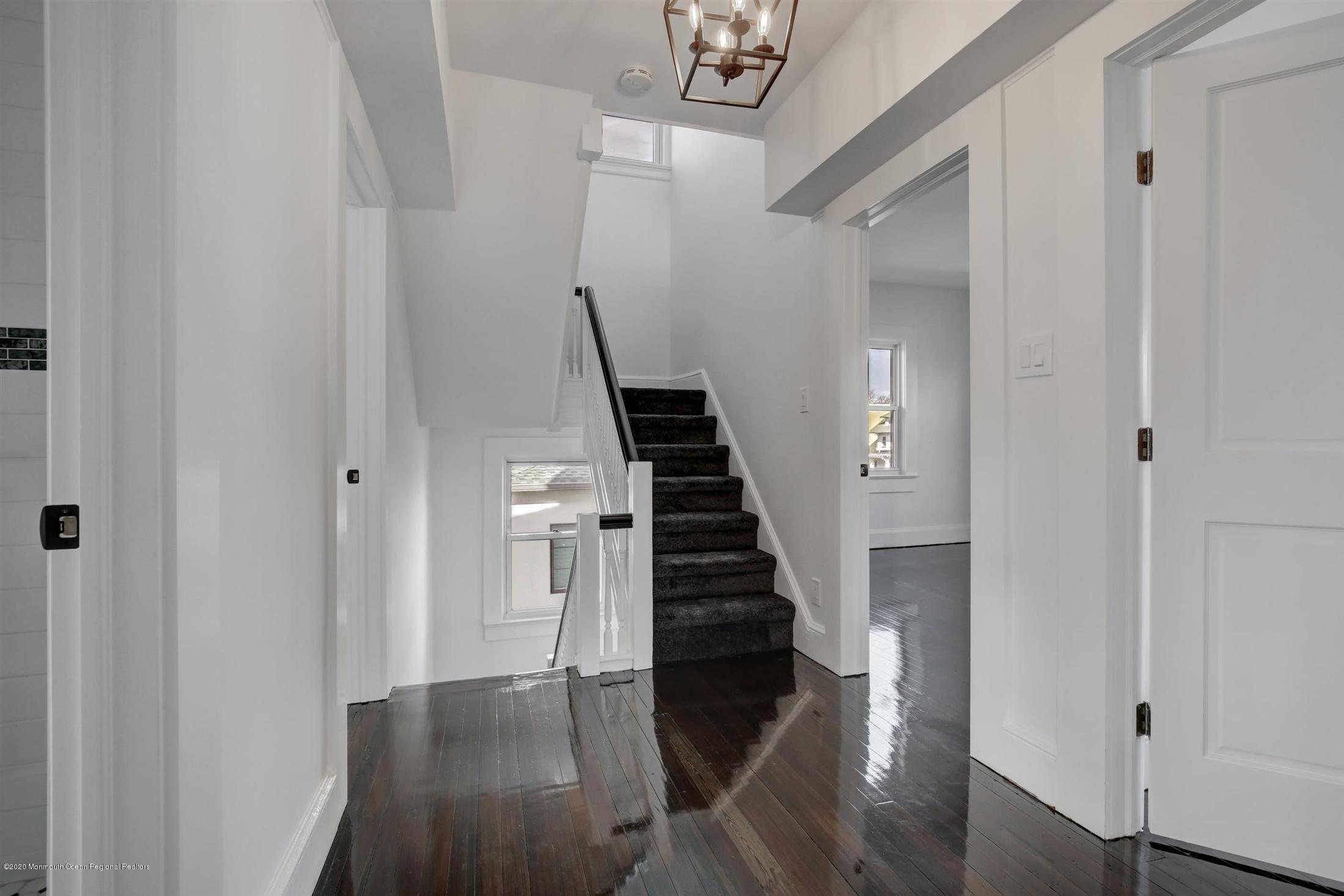 60 Monmouth Drive Deal, NJ 07723 - Photo 17 of 33 a view of entryway and hall with wooden floor