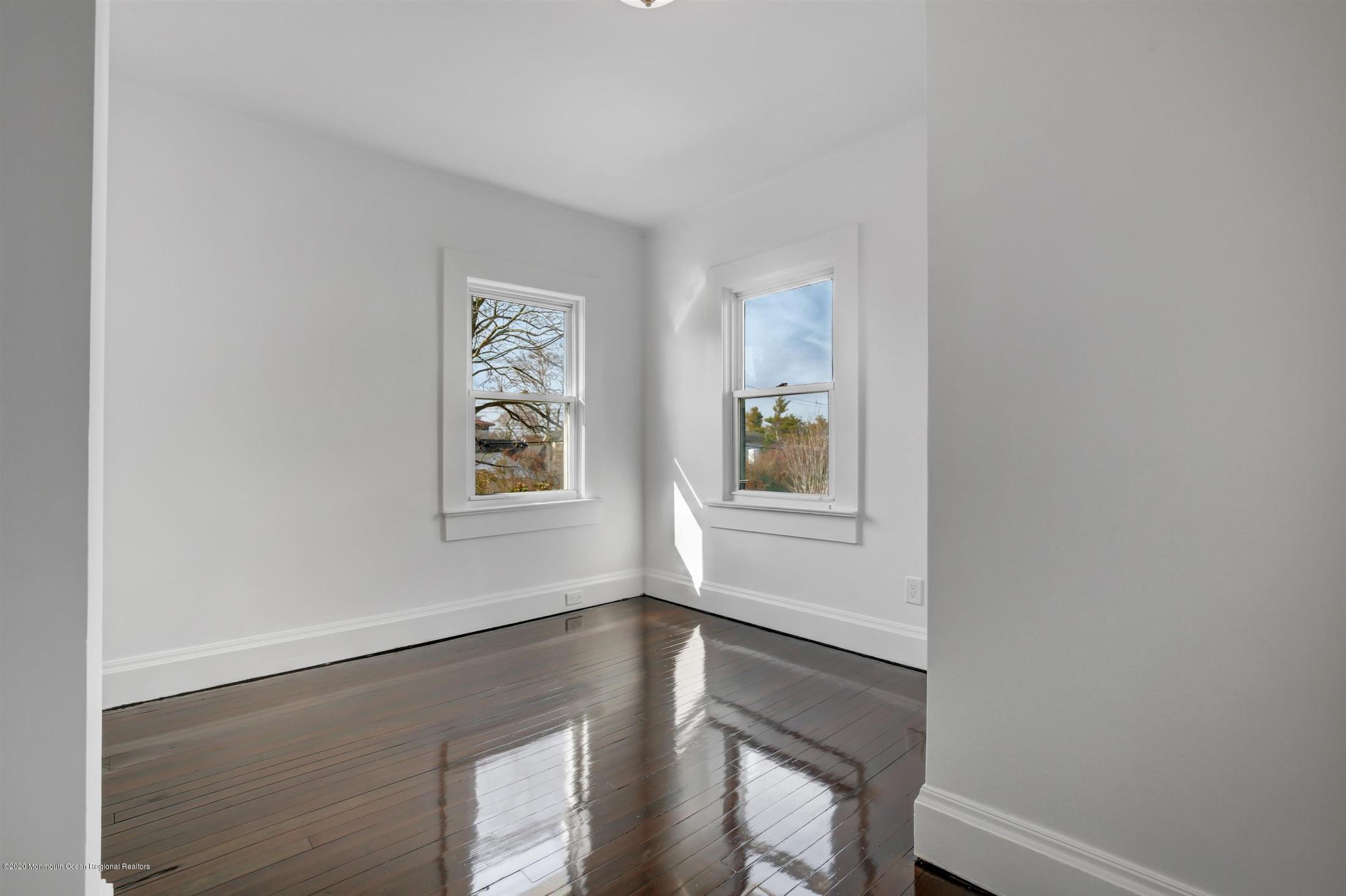 60 Monmouth Drive Deal, NJ 07723 - Photo 20 of 33 a view of an empty room with a window