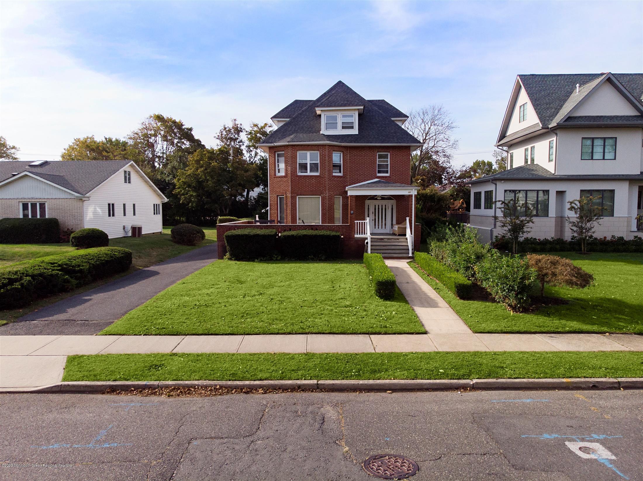 60 Monmouth Drive Deal, NJ 07723 - Photo 31 of 33 a front view of a house with a yard