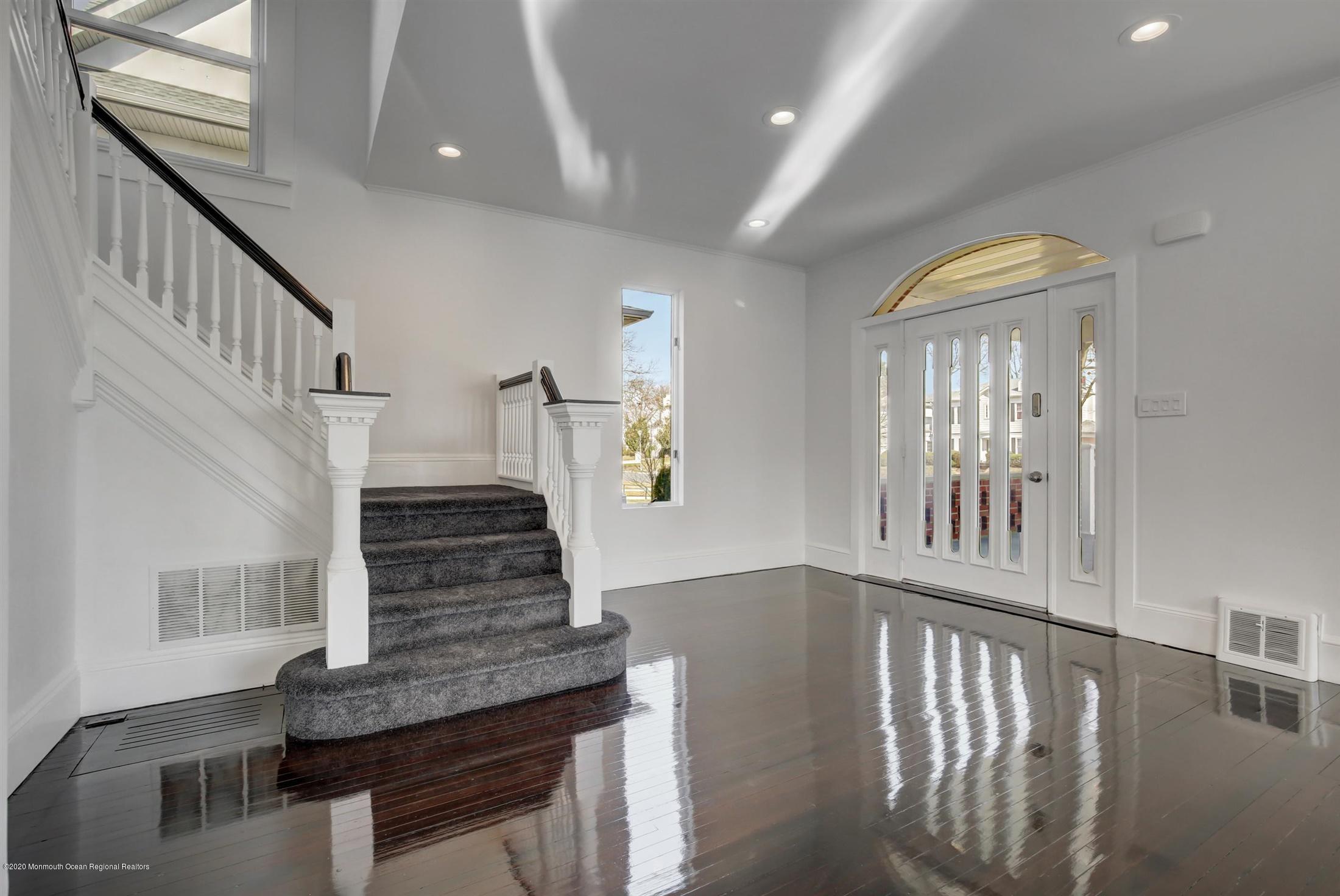 60 Monmouth Drive Deal, NJ 07723 - Photo 5 of 33 a view of entryway and hall with wooden floor