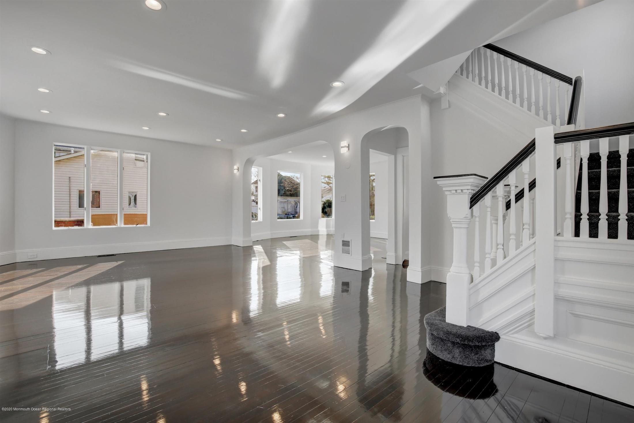 60 Monmouth Drive Deal, NJ 07723 - Photo 7 of 33 a view of entryway and hall with wooden floor