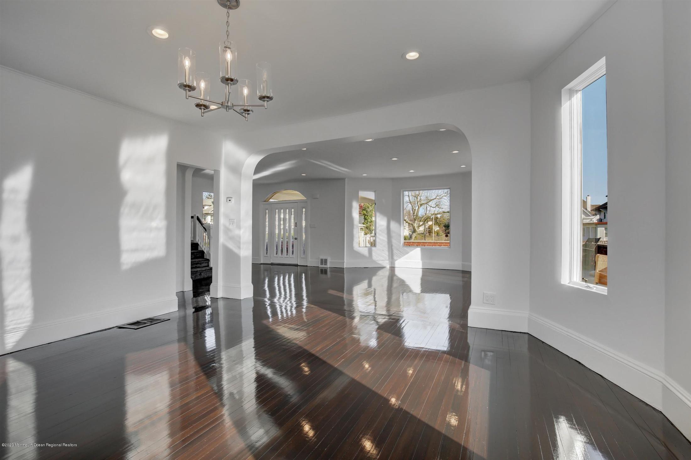 60 Monmouth Drive Deal, NJ 07723 - Photo 10 of 33 a view of a dining room with furniture and wooden floor