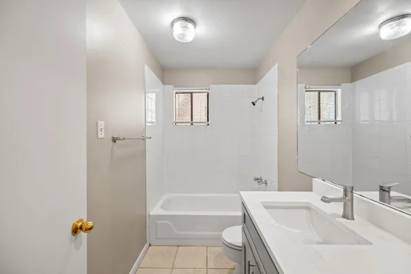 a bathroom with a sink and a bathtub