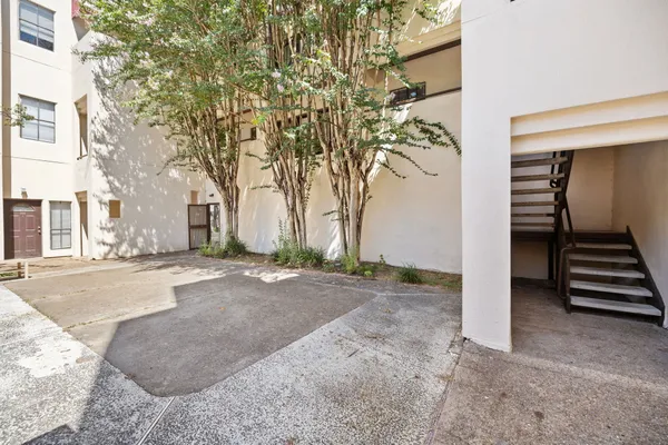 a view of a backyard of the house