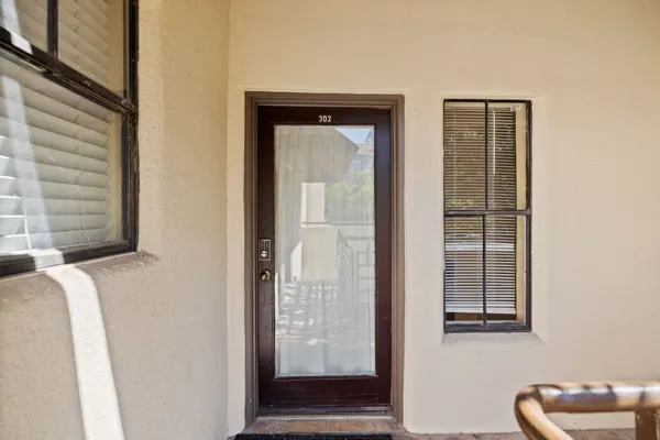 a view of front door and bedroom