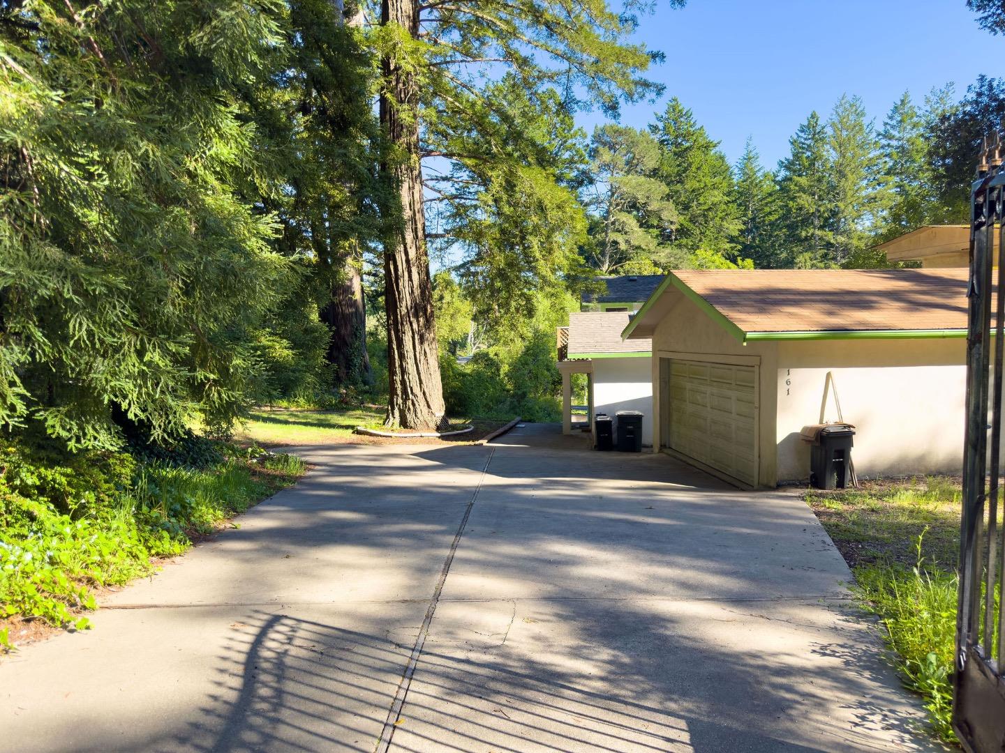 161 Ware Road Woodside, CA 94062 - Photo 11 of 52 a view of a house with a yard and tree s