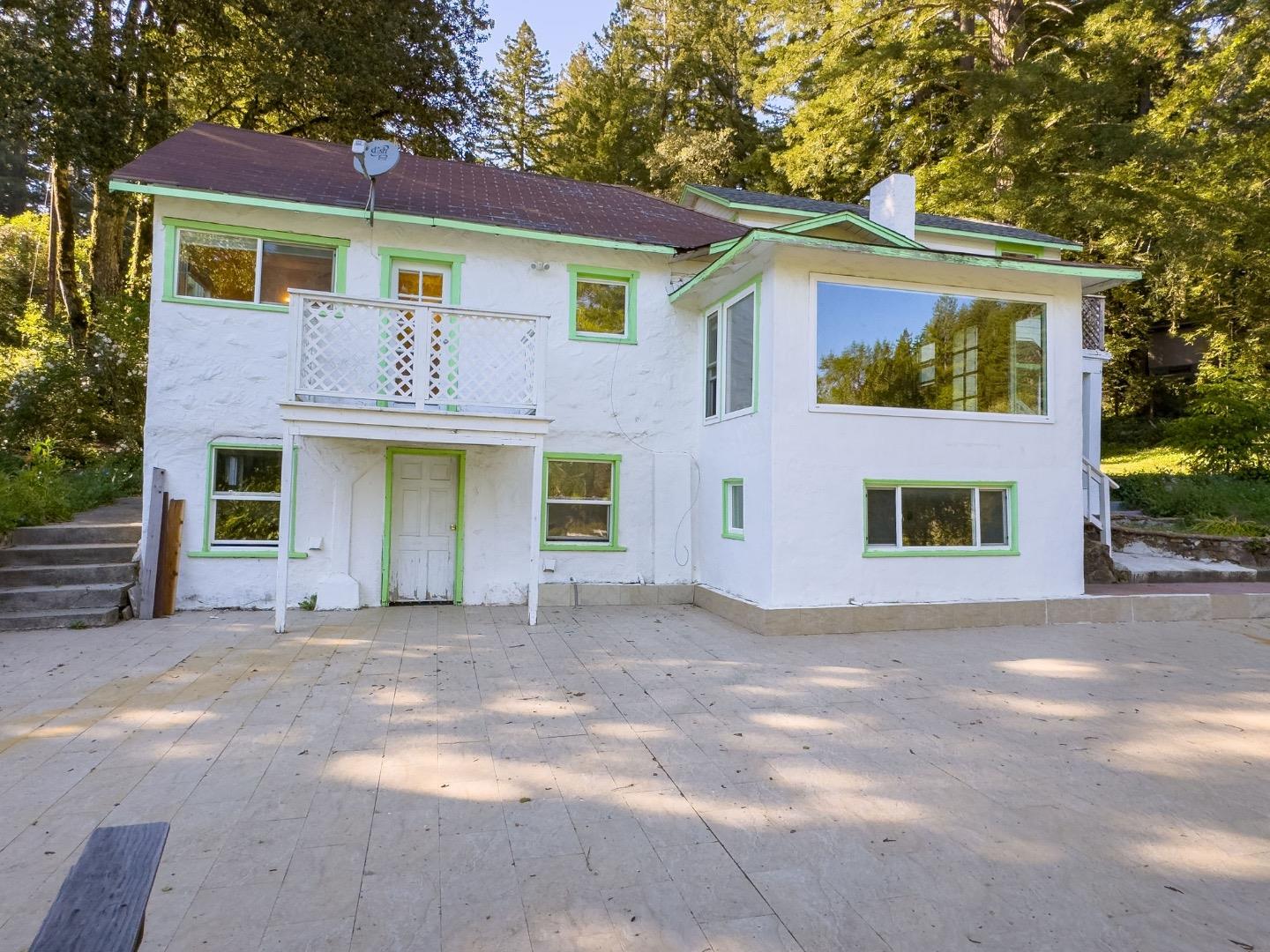 161 Ware Road Woodside, CA 94062 - Photo 17 of 52 a front view of a house with garden