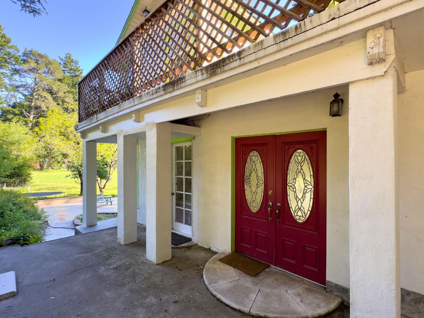 161 Ware Road Woodside, CA 94062 - Photo 24 of 52 a front view of a house with garden