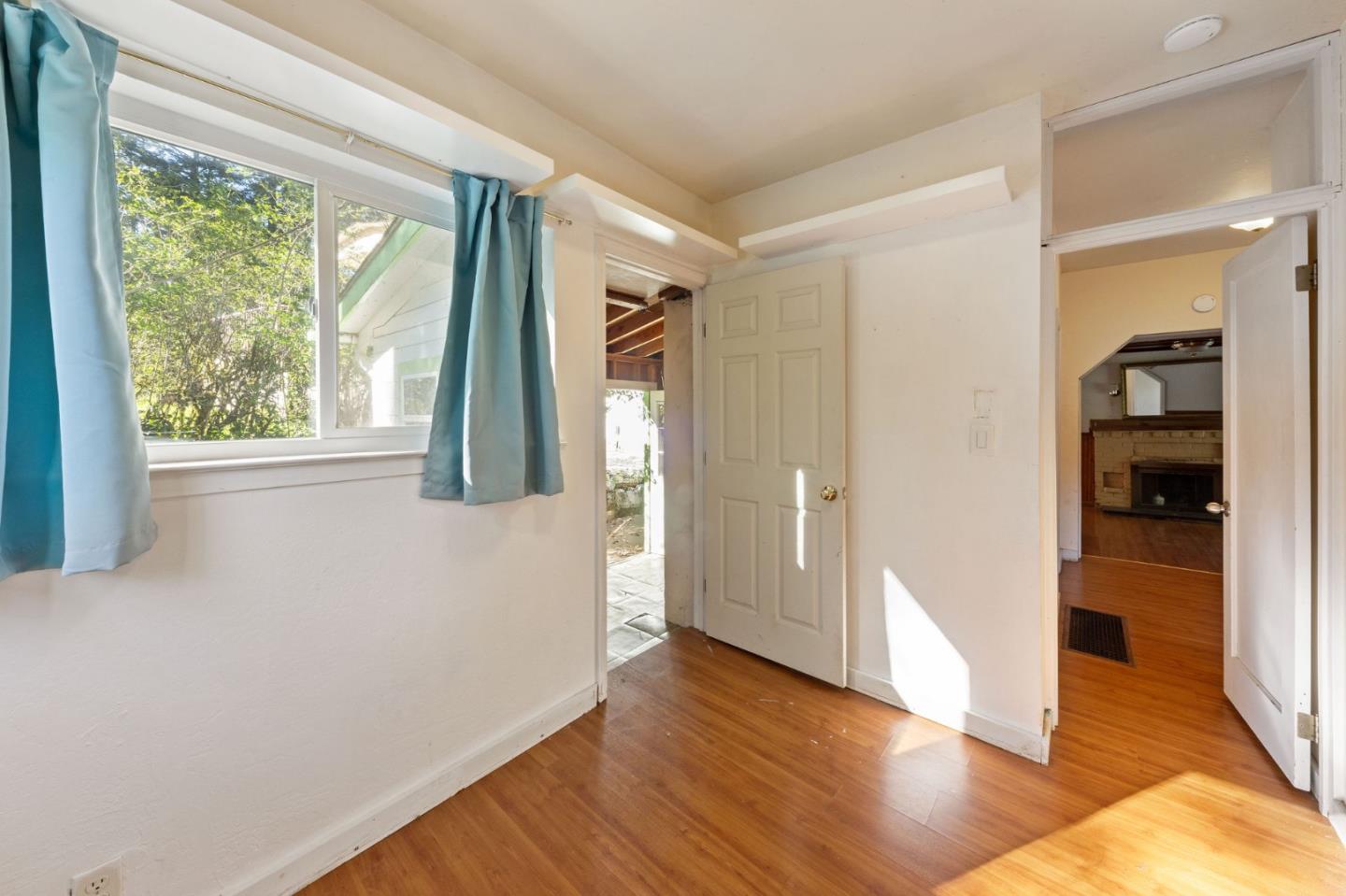 161 Ware Road Woodside, CA 94062 - Photo 39 of 52 a view of hallway with window and wooden floor