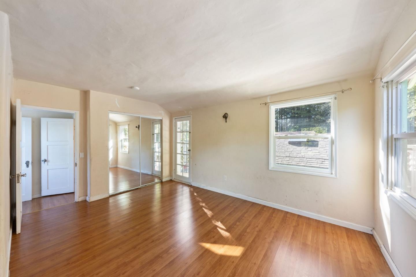 161 Ware Road Woodside, CA 94062 - Photo 42 of 52 a view of an empty room with wooden floor and a window