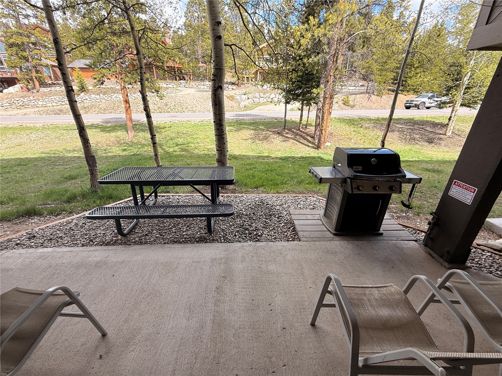 187 Fuller Placer Road, Unit B Breckenridge, CO 80424 - Photo 33 of 33 a view of a lake with a table and chairs