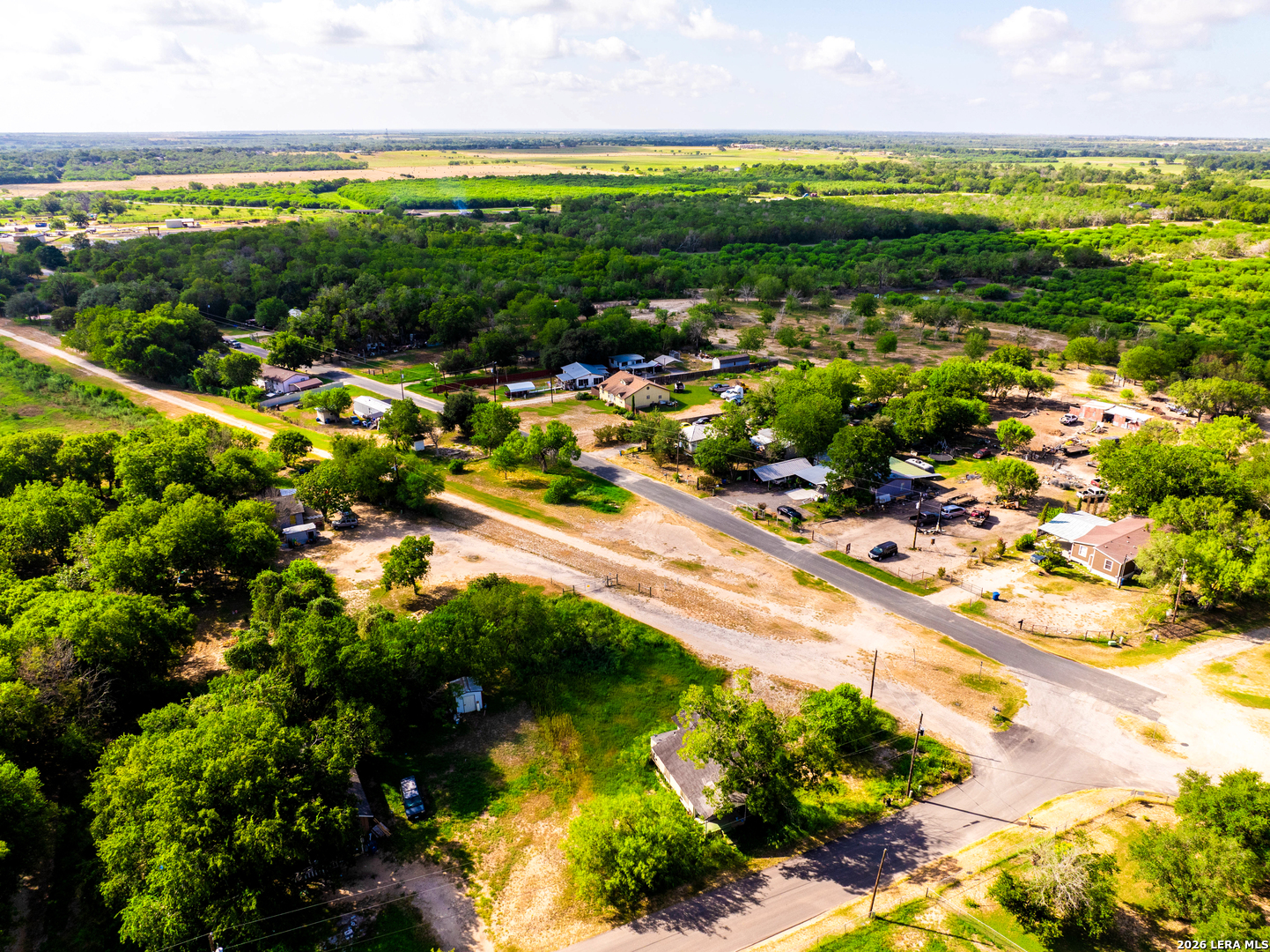 710 Goliad Road Floresville, TX 78114 - Photo 11 of 31 a view of a lake with a city