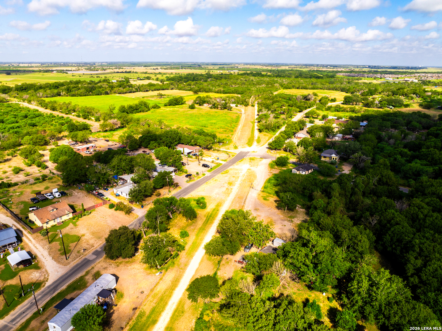 710 Goliad Road Floresville, TX 78114 - Photo 13 of 31 a view of an ocean and a yard
