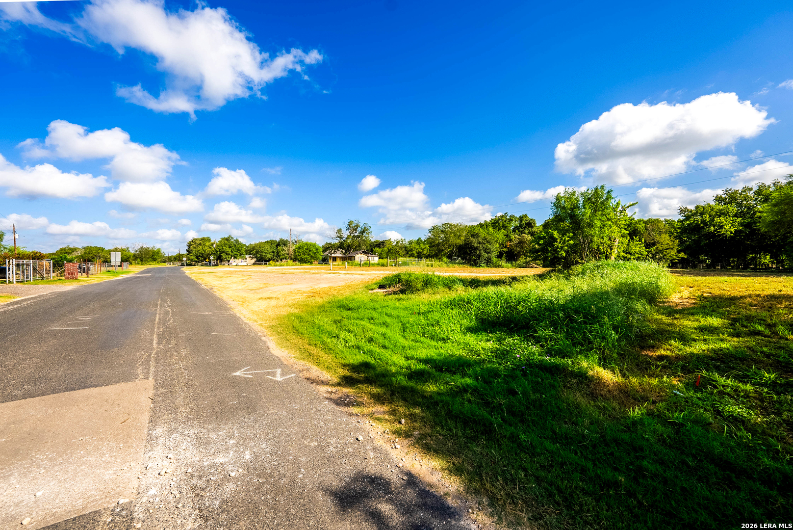 710 Goliad Road Floresville, TX 78114 - Photo 28 of 31 a view of a lake with a big yard
