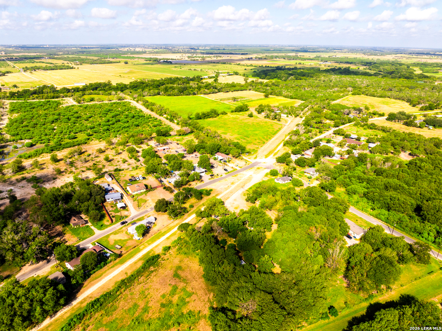 710 Goliad Road Floresville, TX 78114 - Photo 5 of 31 a view of an outdoor space and a lake view