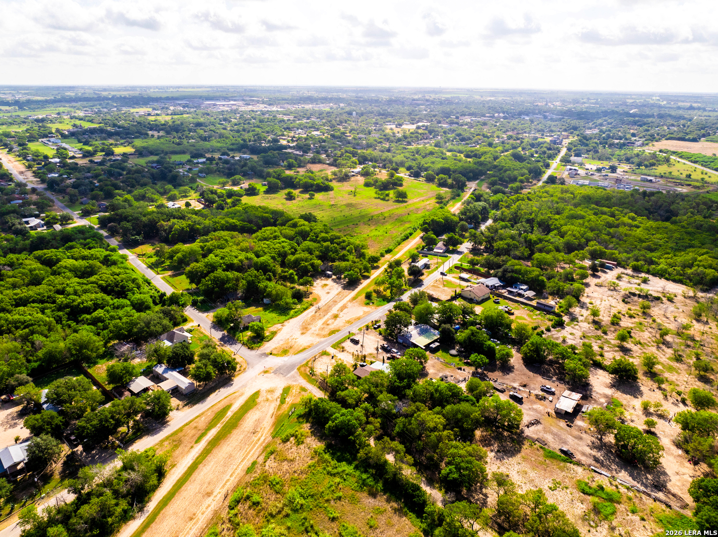 710 Goliad Road Floresville, TX 78114 - Photo 9 of 31 an aerial view of residential houses with outdoor space