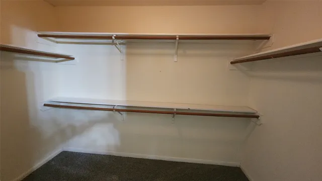 a bathroom with a tub sink and a mirror