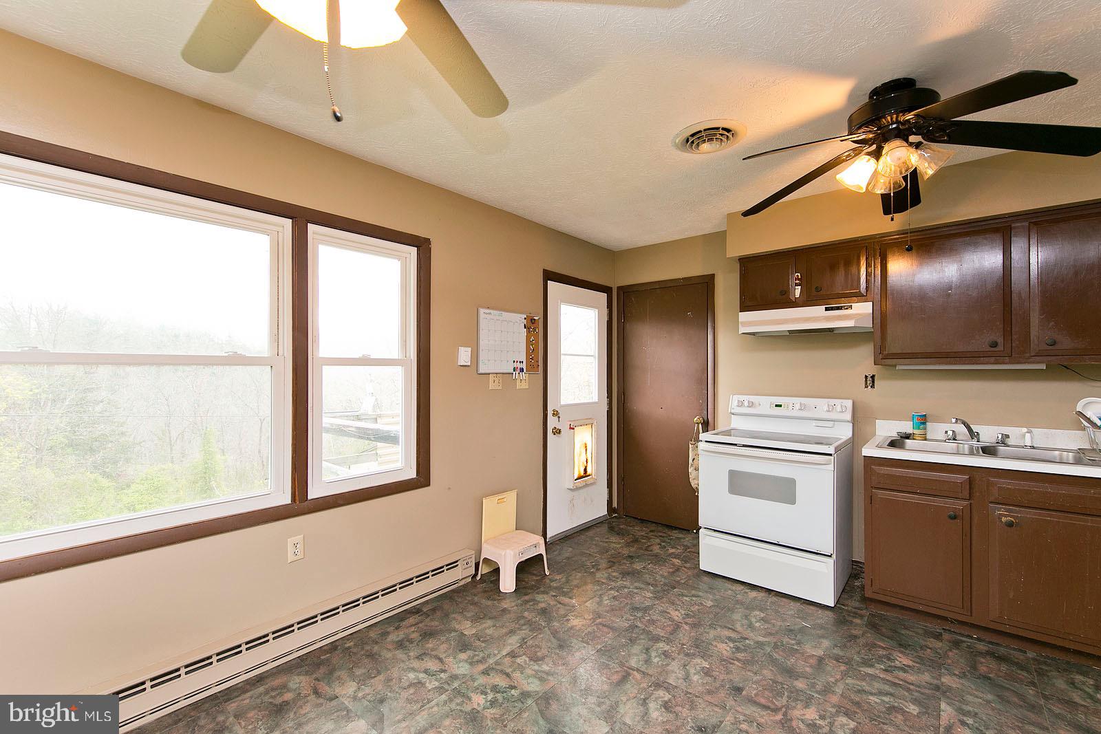 60 Laing Road Front Royal, VA 22630 - Photo 8 of 51 Kitchen with Rear Deck Access - Main Level
