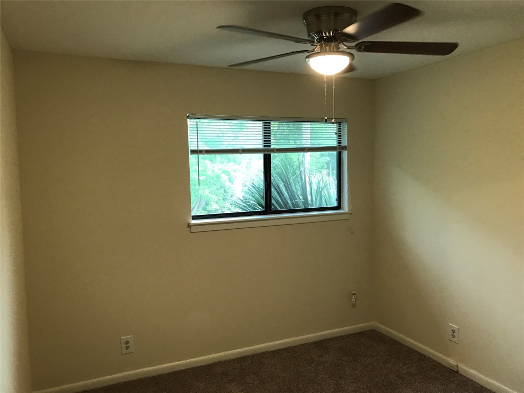 5001 Bull Creek Road, Unit 108 Austin, TX 78731 - Photo 8 of 21 an empty room with a window