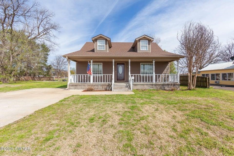 524 South Main Street Ridgely, TN 38080 - Photo 1 of 23 a front view of a house with a garden