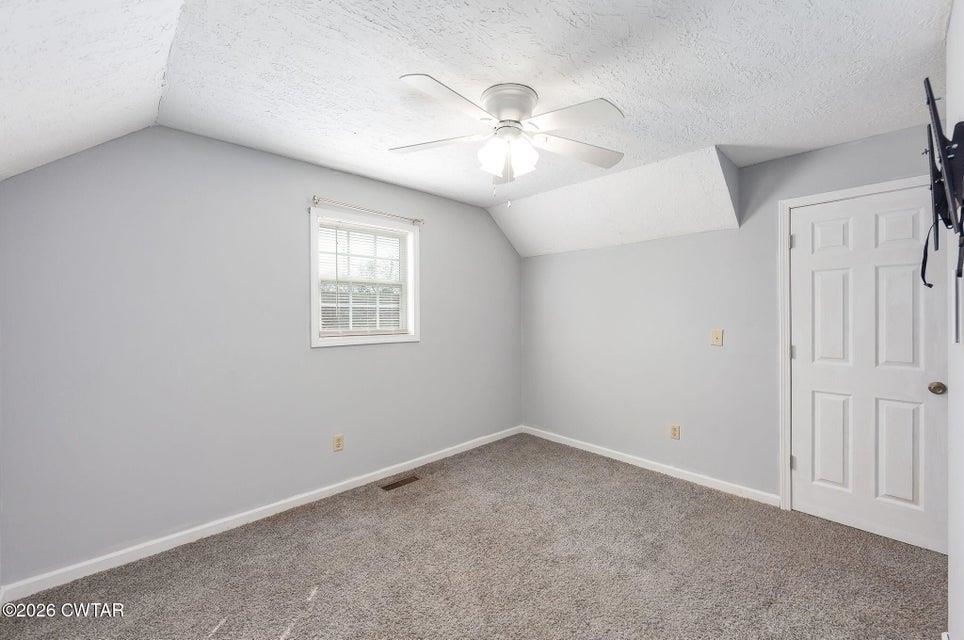524 South Main Street Ridgely, TN 38080 - Photo 14 of 23 an empty room with windows and fan