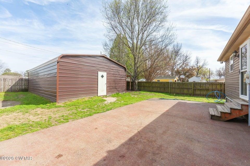 524 South Main Street Ridgely, TN 38080 - Photo 20 of 23 a view of a house with a yard