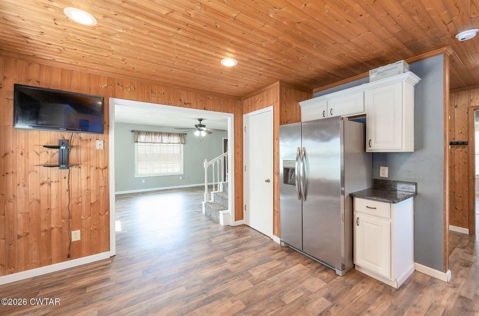 524 South Main Street Ridgely, TN 38080 - Photo 8 of 23 a view of a kitchen with wooden floor and electronic appliances