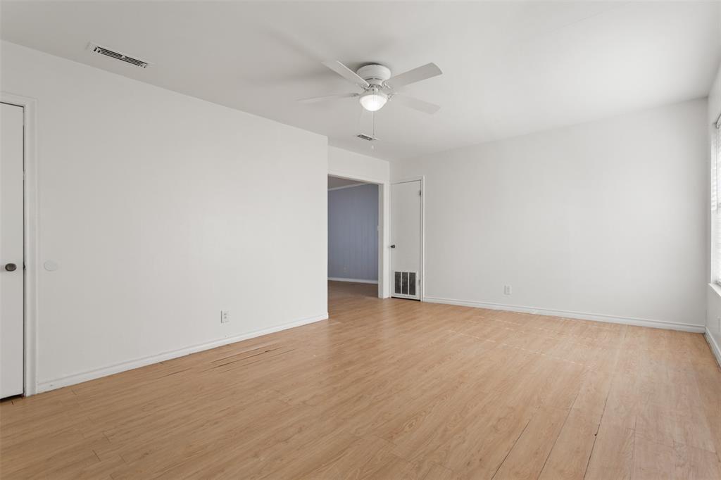 3126 Colgate Avenue Tyler, TX 75701 - Photo 9 of 33 a view of an empty room with a ceiling fan