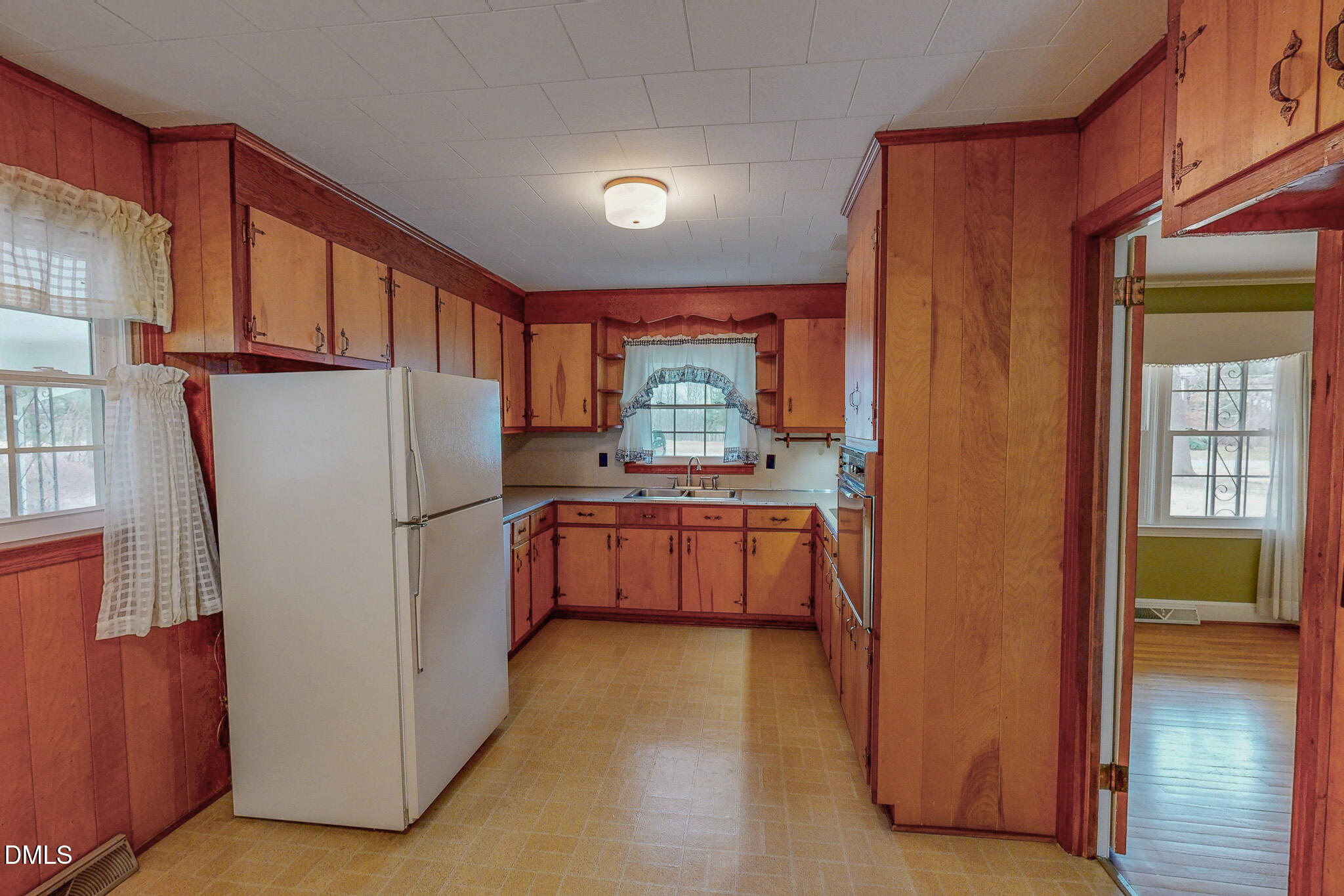 333 Allensville Road Roxboro, NC 27574 - Photo 15 of 43 a kitchen with refrigerator and window