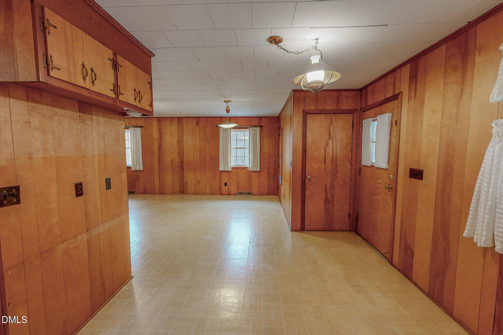 333 Allensville Road Roxboro, NC 27574 - Photo 17 of 43 a view of a hallway with wooden shelves