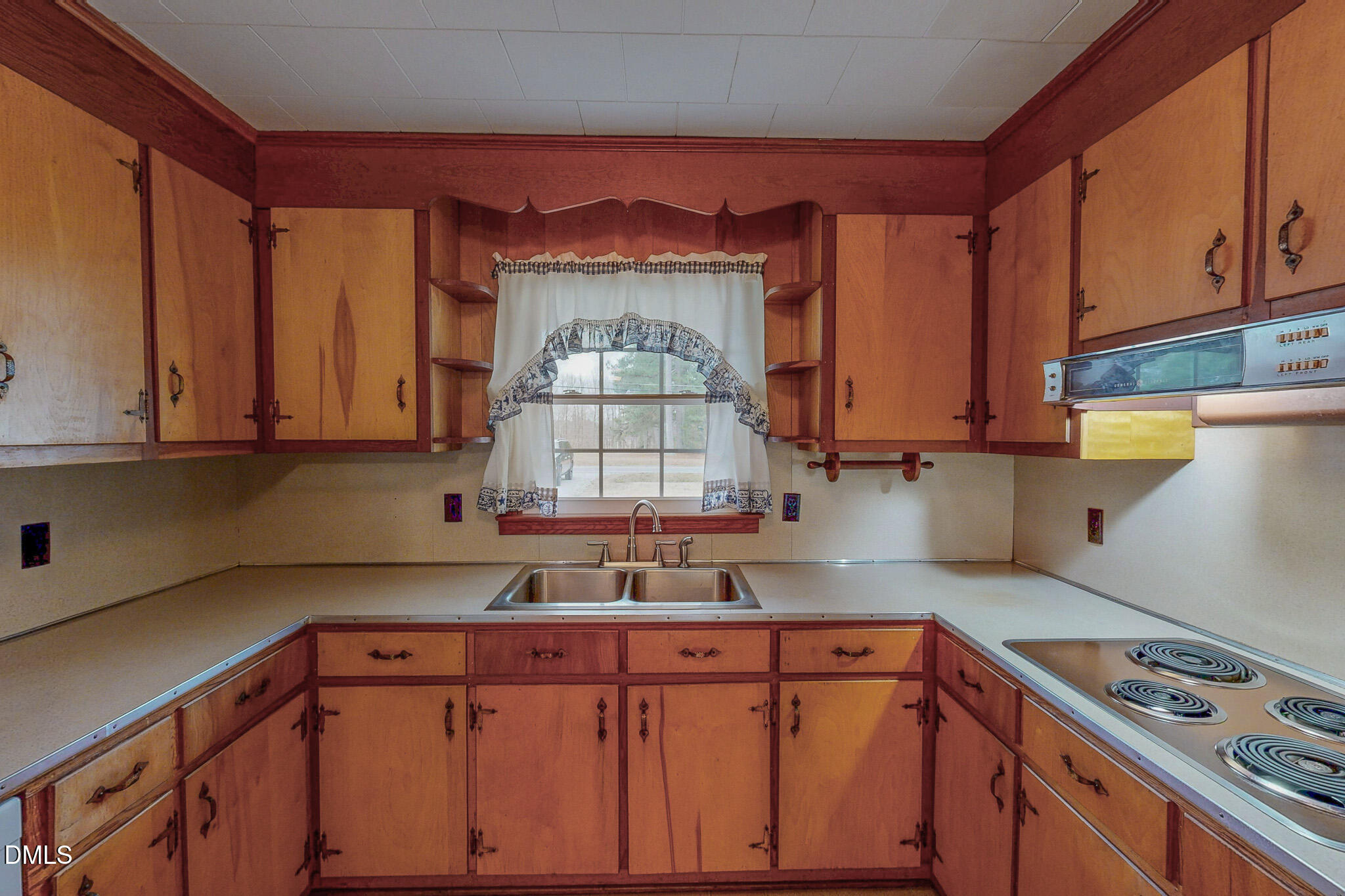 333 Allensville Road Roxboro, NC 27574 - Photo 18 of 43 a kitchen with stainless steel appliances granite countertop a sink stove and cabinets
