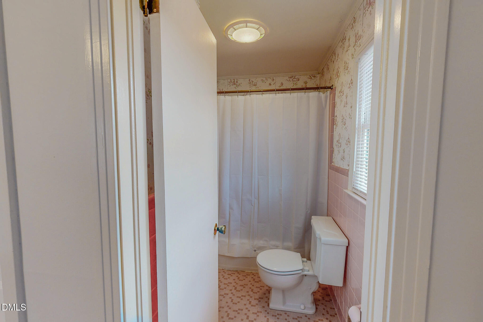 333 Allensville Road Roxboro, NC 27574 - Photo 28 of 43 a bathroom with a toilet a sink and a mirror