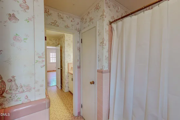 a bathroom with a toilet and a sink