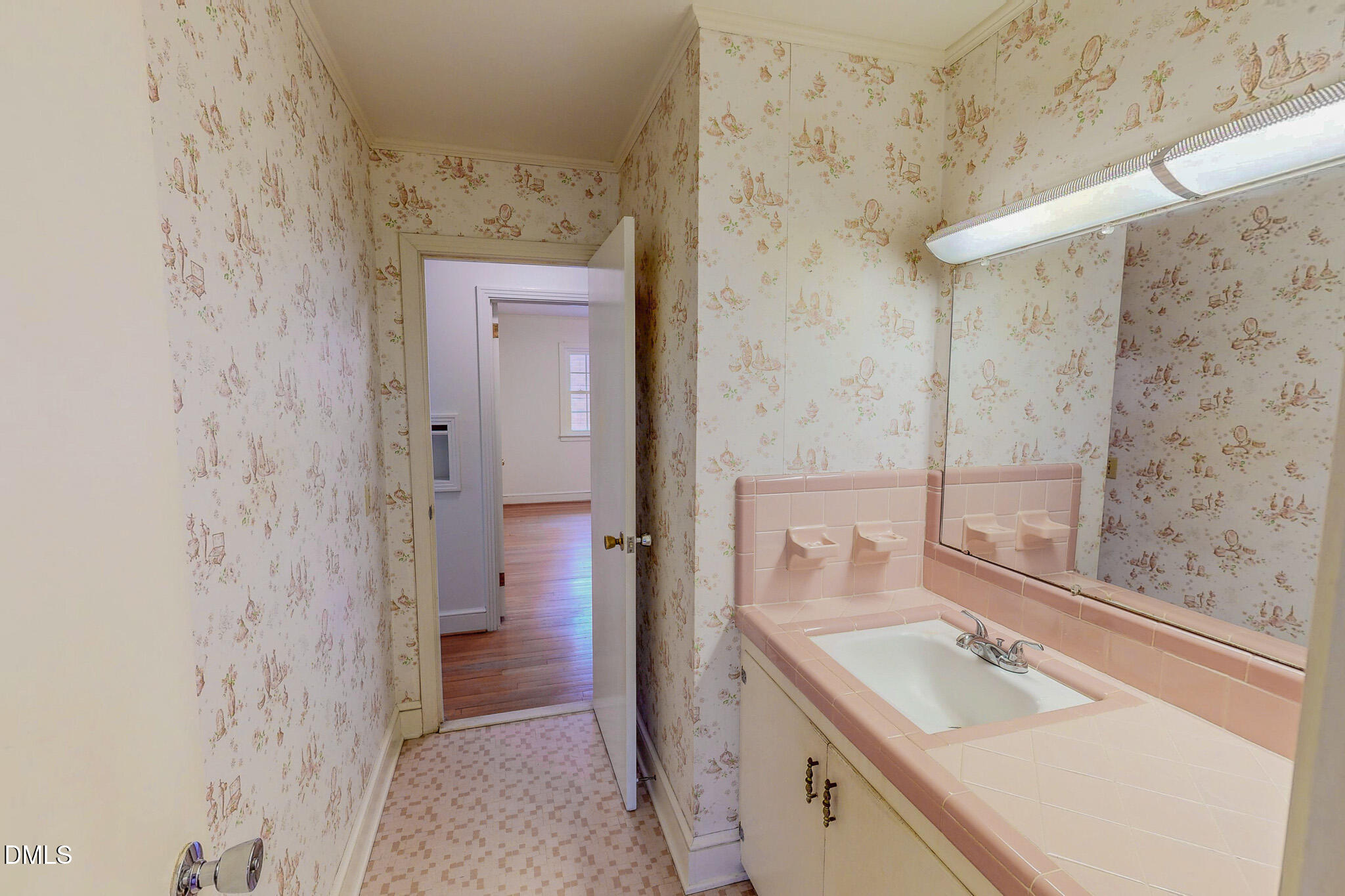 333 Allensville Road Roxboro, NC 27574 - Photo 31 of 43 a bathroom with a sink a toilet and shower