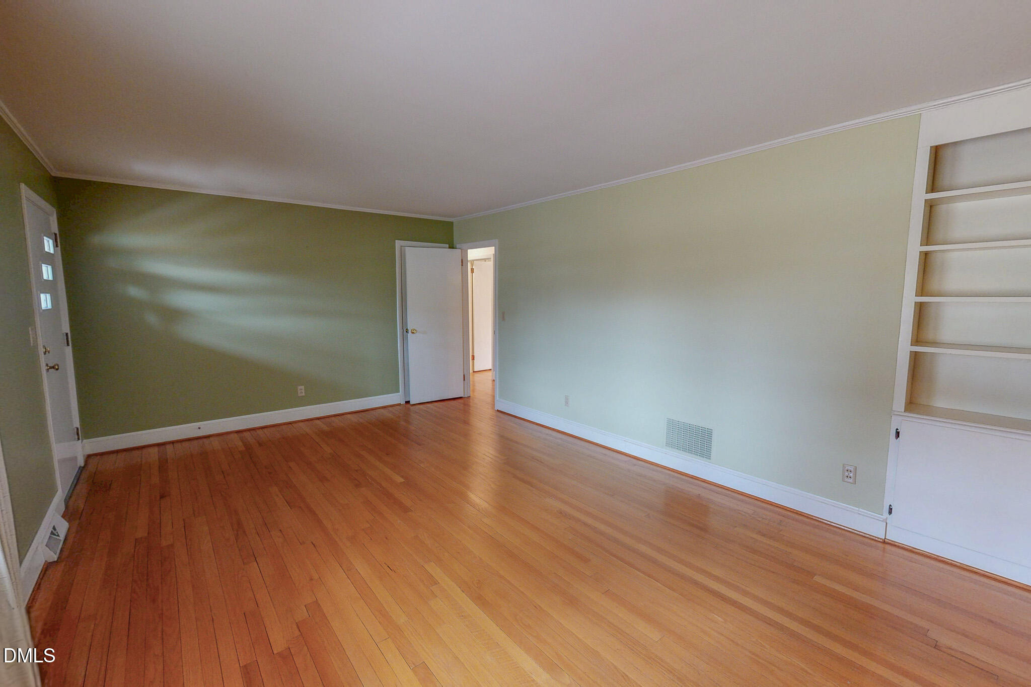 333 Allensville Road Roxboro, NC 27574 - Photo 4 of 43 a view of empty room with wooden floor