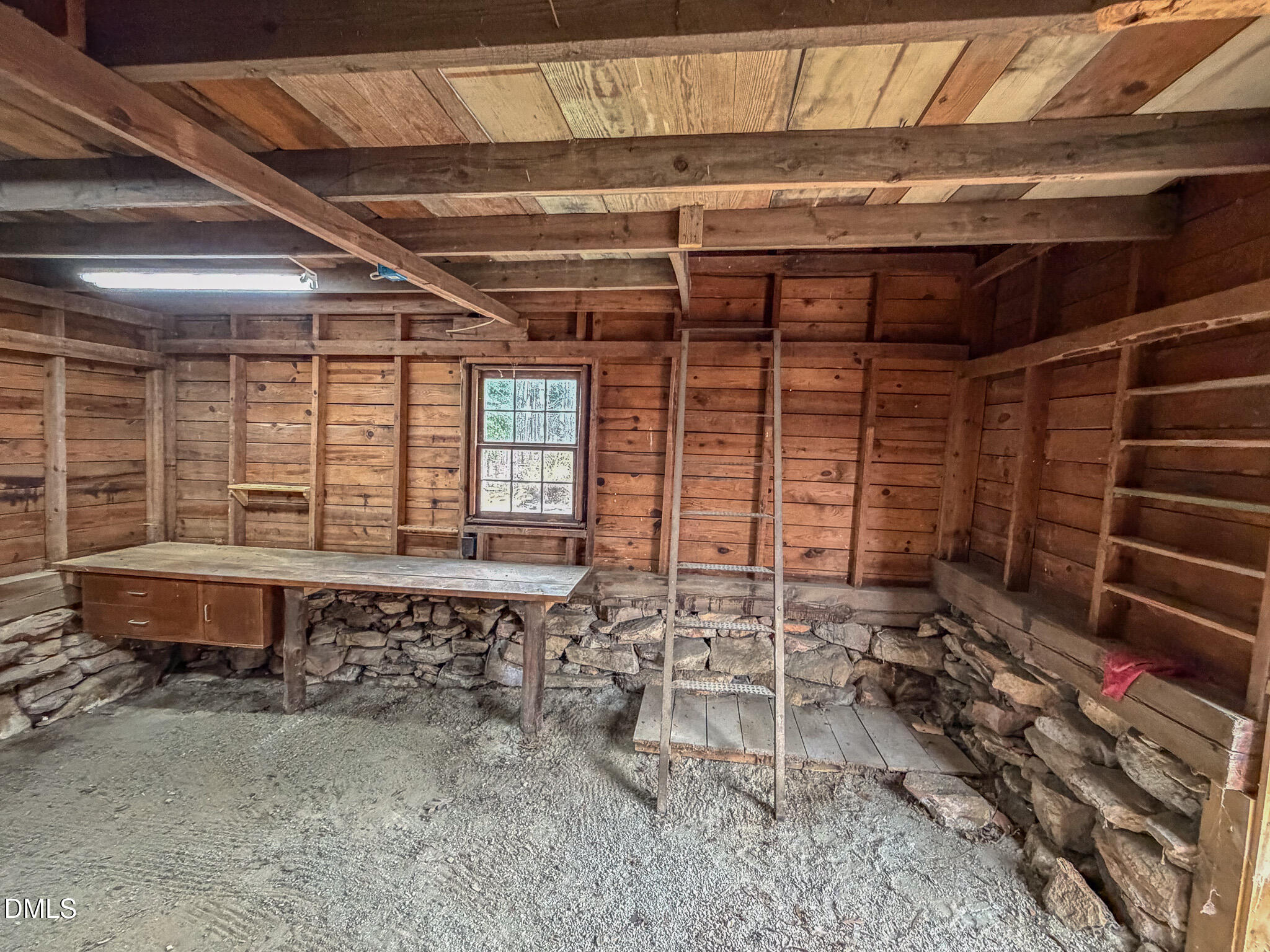 333 Allensville Road Roxboro, NC 27574 - Photo 9 of 43 a room with wooden walls