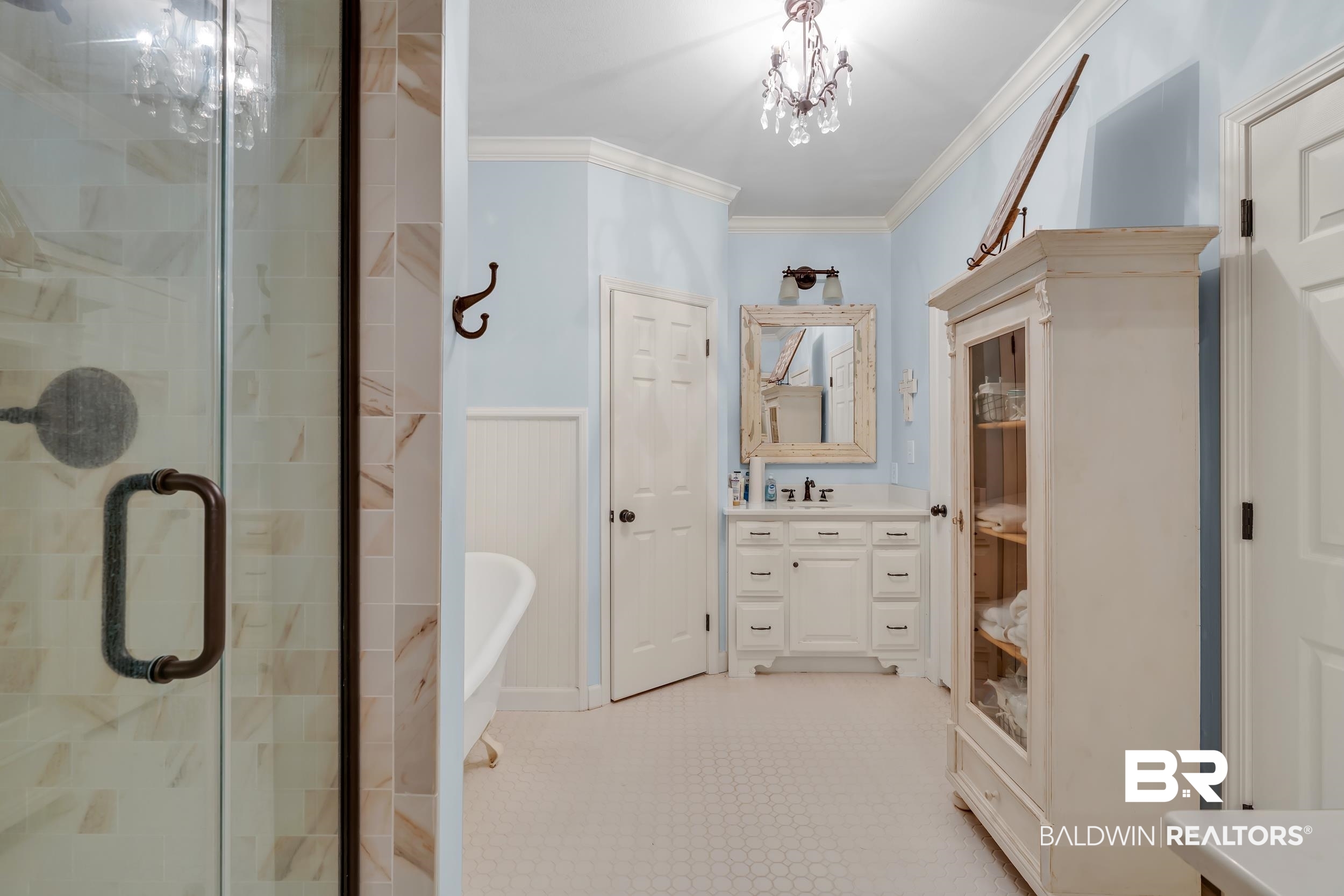 2 Navy Lane Daphne, AL 36527 - Photo 19 of 28 Bathroom with crown molding, vanity, a shower stall, a freestanding bath, and a chandelier
