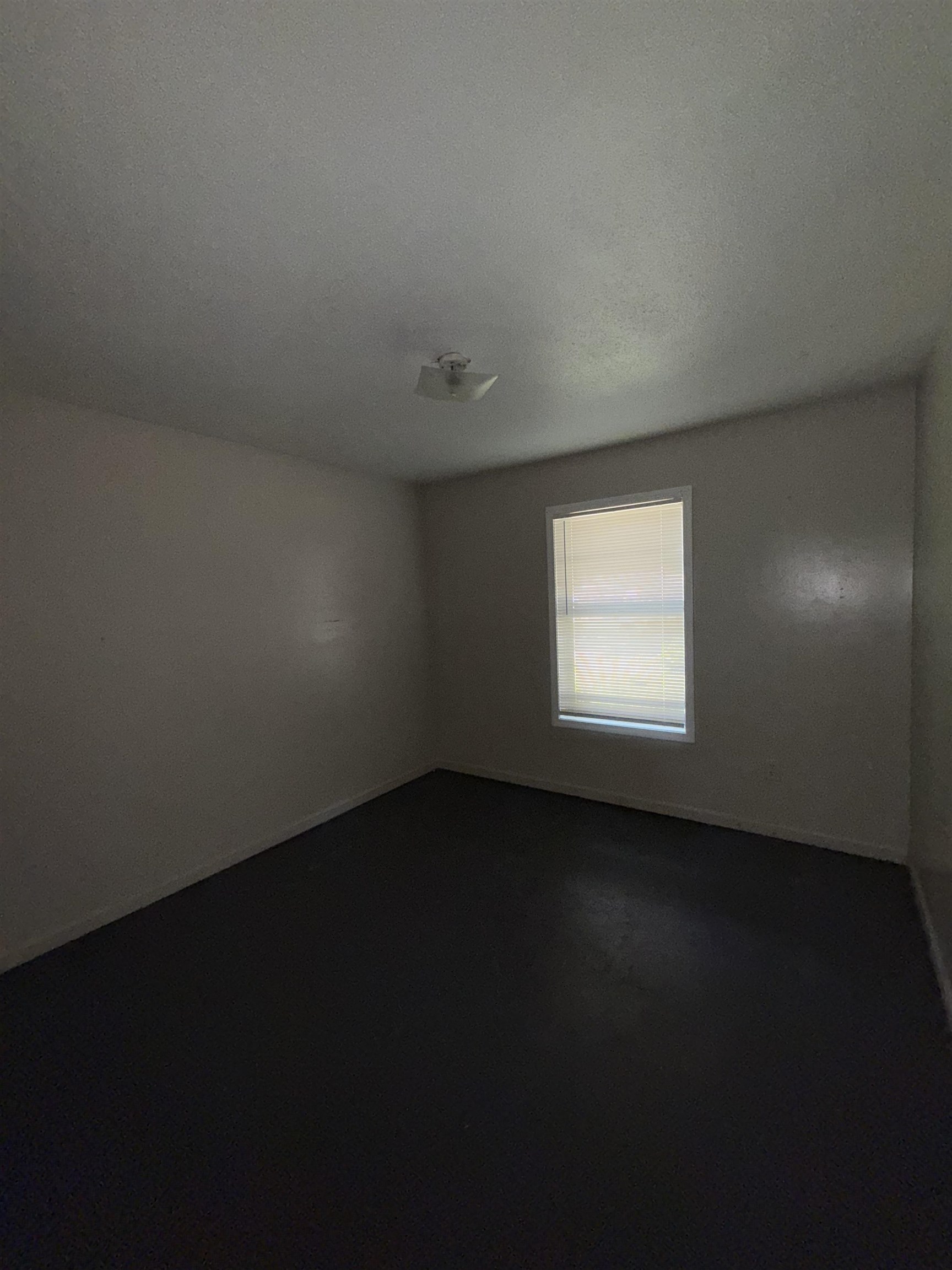 820 Archie Drive Memphis, TN 38127 - Photo 9 of 11 a view of an empty room and window