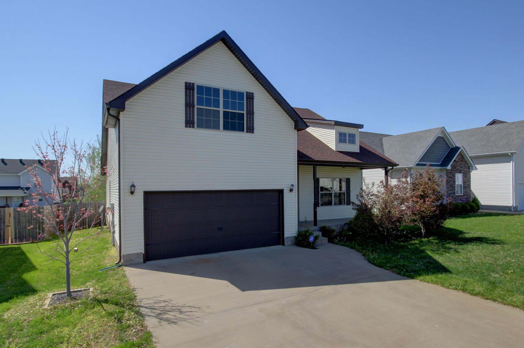 3736 Suiter Road Clarksville, TN 37040 - Photo 8 of 21 a front view of house with a garden
